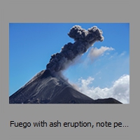 Fuego with ash eruption, note people in the lower right corner